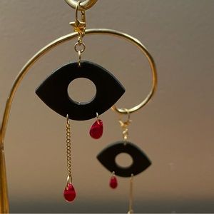 ‘Evil’ eye earrings